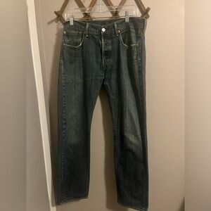 Levi’s 501 original fit minor distressing on hems as shown 33X32 button fly